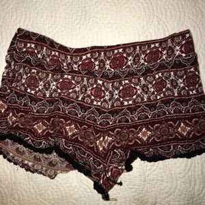 Martin and black flowy shorts